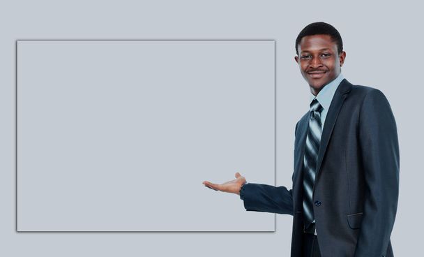 african american business man showing blank signboard, isolated over white background. - Foto, imagen