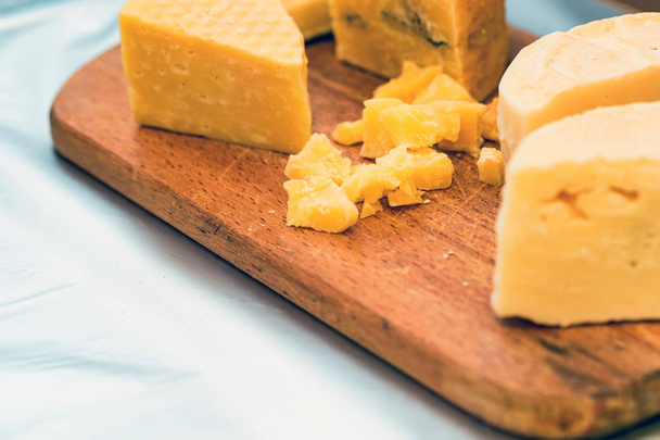 Close-up of homemade cheese at country fair - Fotó, kép