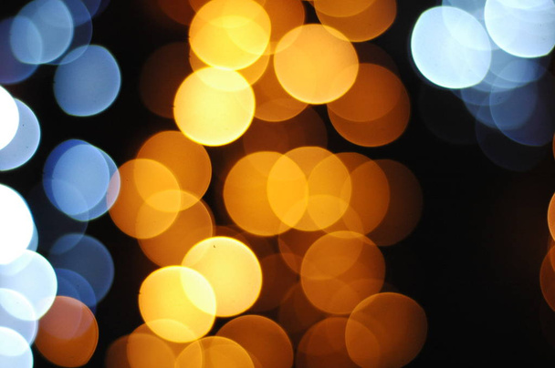 Abstract blurred background: New Year or Christmas bokeh. - Foto, imagen