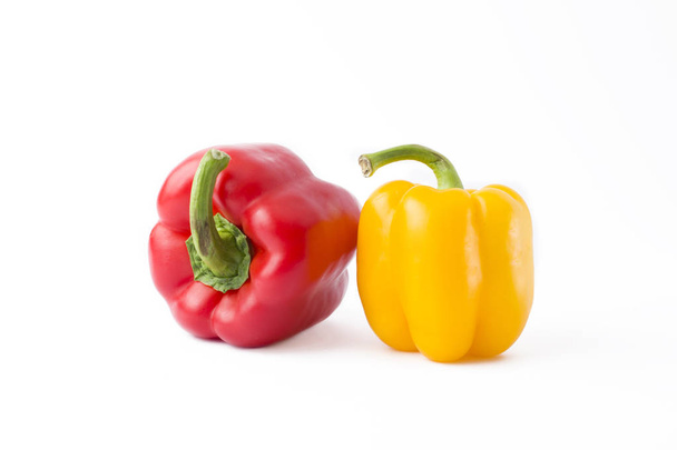 Fresh vegetables on a white background.Yellow pepper, red pepper on a white background - Foto, Bild