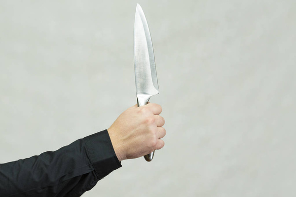Knife in hand. - Фото, изображение
