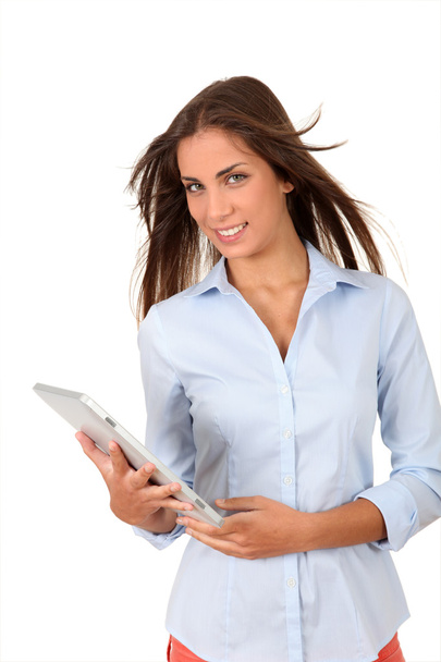 Portrait of beautiful young woman using electronic tablet - Photo, image