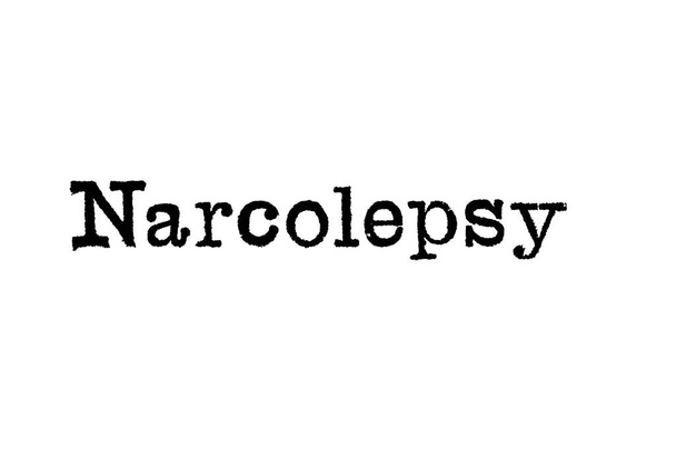 das Wort Narkolepsie aus einer Schreibmaschine auf weißem Hintergrund - Foto, Bild