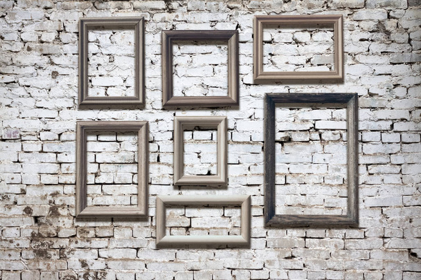 Set of old photo frames on brick wall background - Фото, зображення