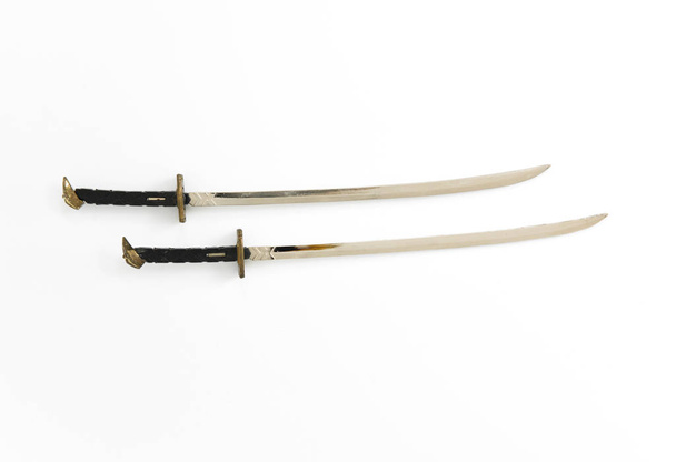 Samurai zwaard model op het witte doek - Foto, afbeelding