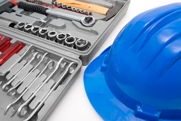 Casco azul de seguridad y caja de herramientas
 - Foto, Imagen