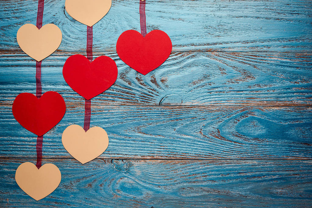 Valentines day background decorated with red hearts/copy space - Zdjęcie, obraz