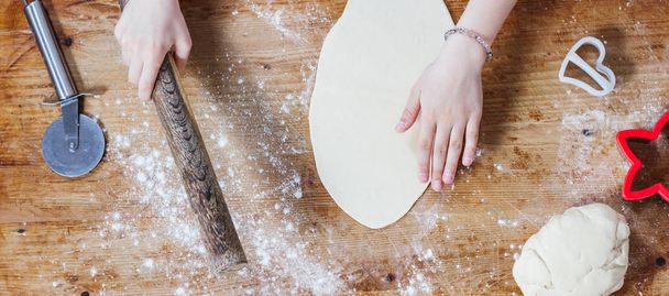 little girl making dough at home kitchen - Foto, Imagem