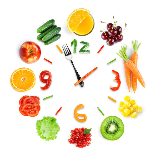 Food clock with fresh fruits and vegetables - Zdjęcie, obraz