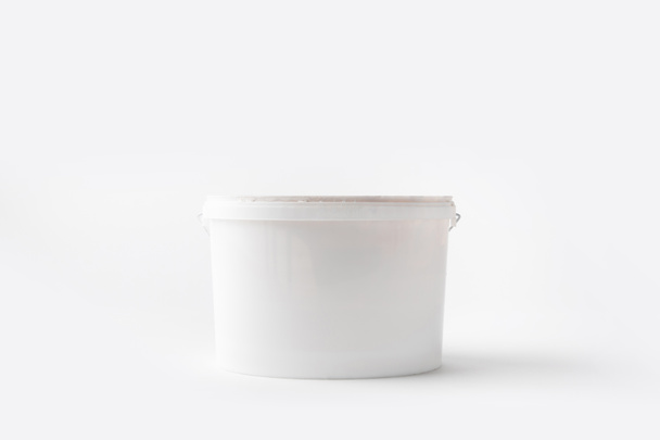 one plastic bucket with paint isolated on white - Zdjęcie, obraz