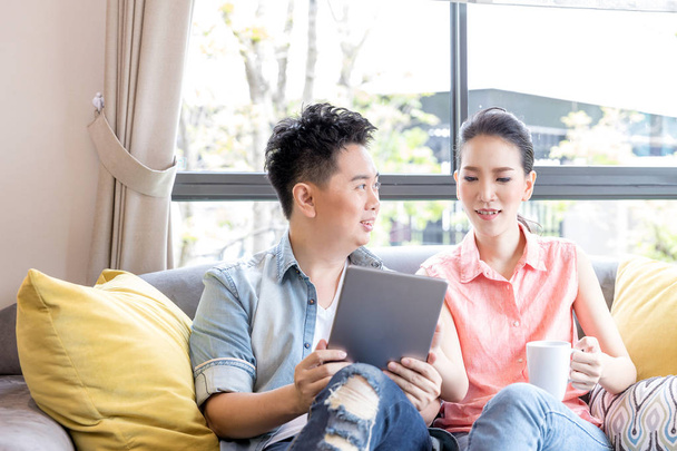 Asian Couple using digital tablet  - Foto, Imagen