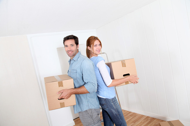Couple moving in new house - Photo, Image