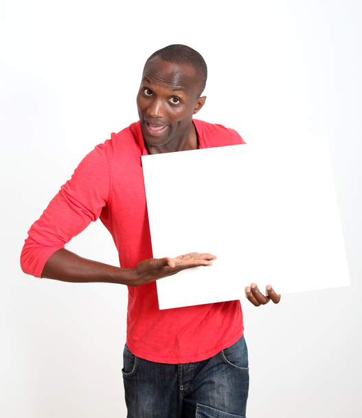 Man in red shirt showing whiteboard - Foto, immagini