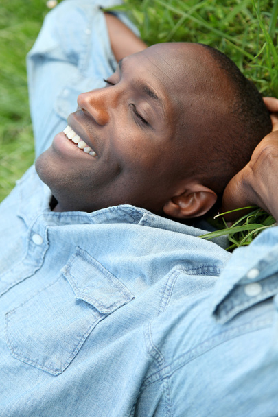 Man taking a nap in park - Zdjęcie, obraz