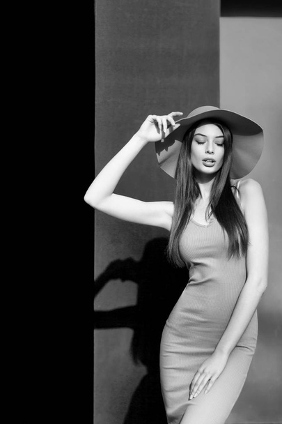 Gorgeous young woman in stylish hat posing  - Valokuva, kuva
