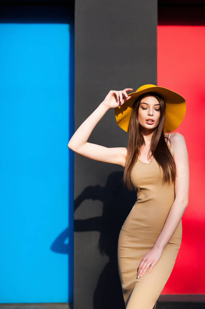 Gorgeous young woman in stylish hat posing  - Foto, afbeelding