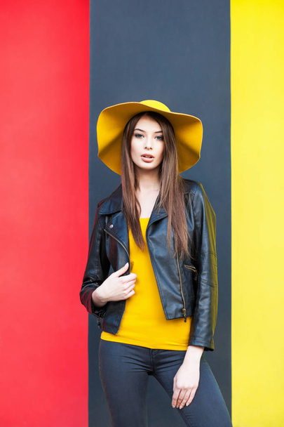 Gorgeous young woman in stylish hat posing  - Foto, imagen