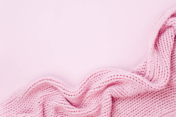 Top view of pink knitted plaid isolated on pink background - Фото, зображення