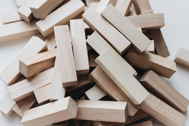 pile of small wooden blocks for Jenga table game  - Foto, imagen