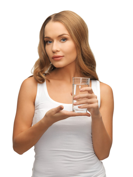 Woman with glass of water - Foto, afbeelding