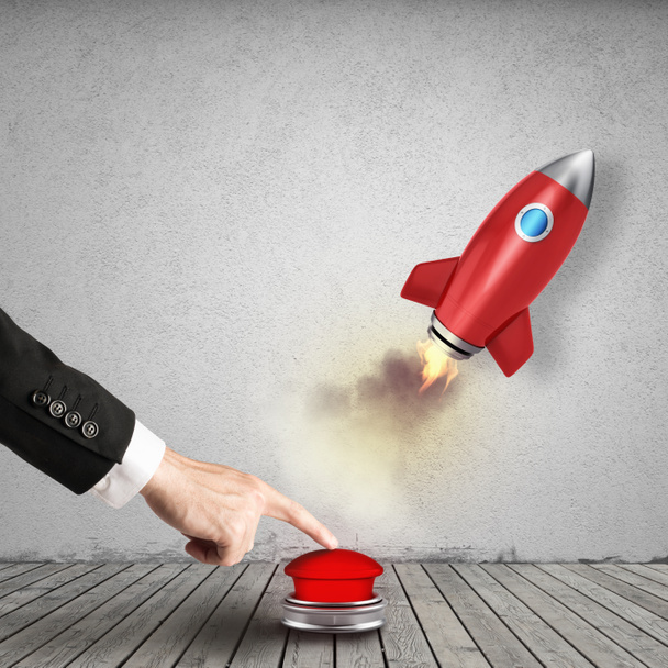 Businessman launching  rocket pushing a red button. 3D Rendering - Photo, Image