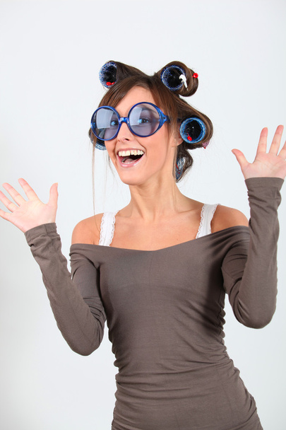 Young funny woman with hair-curlers - Fotografie, Obrázek