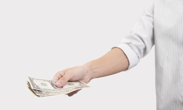 business hand holding dollar bill money. concept saving finance  - Fotó, kép