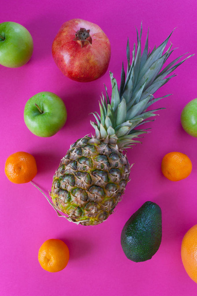 exotic fruits on a pink background - Fotó, kép