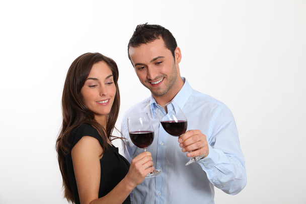 Couple tasting red wine - Foto, Imagen