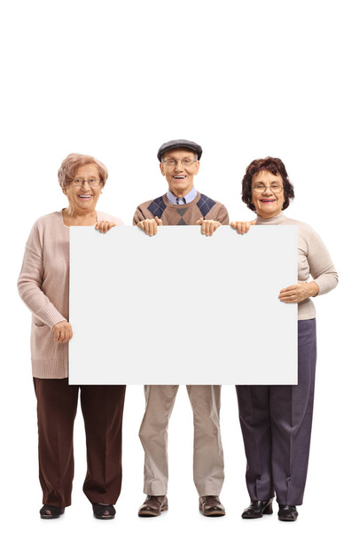 Seniors holding a blank signboard - Foto, immagini