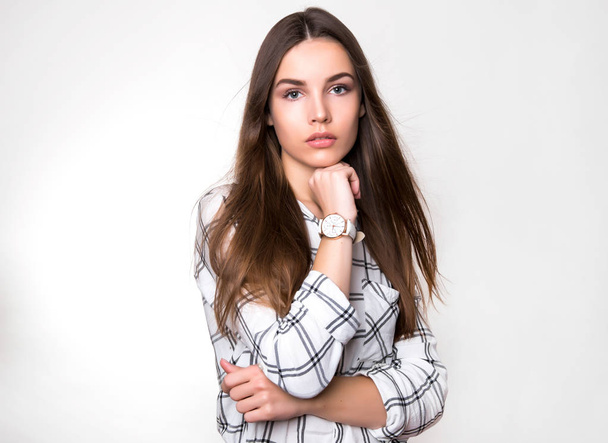 beautiful young woman with long hair wearing wrist watch - Valokuva, kuva
