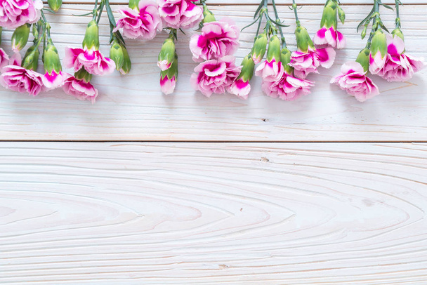 pink spring flower on wooden background - Fotoğraf, Görsel