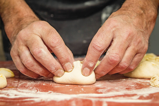 Grandpa rolling dough, making food - Fotó, kép