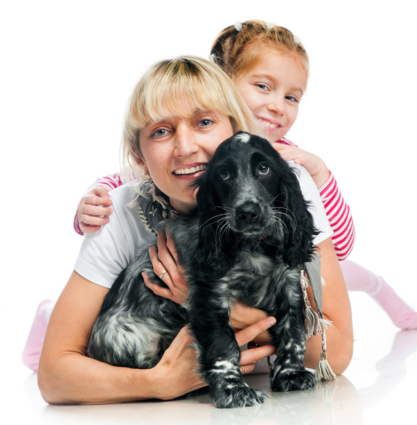 Mother and little girl with dog - Foto, imagen