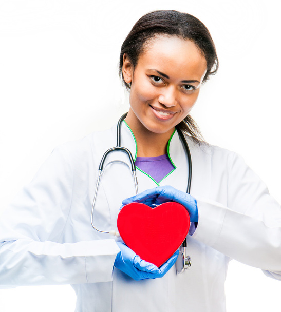 Doctor holding red heart - Фото, зображення