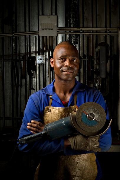 African American with angle grinder - Zdjęcie, obraz