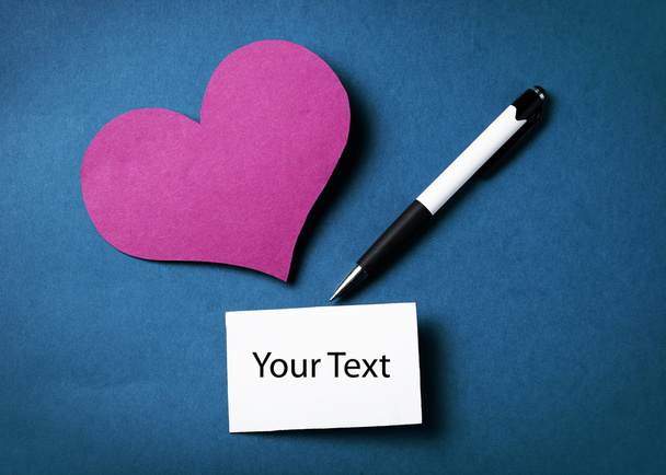 Pen and valentine's heart isolated - 写真・画像