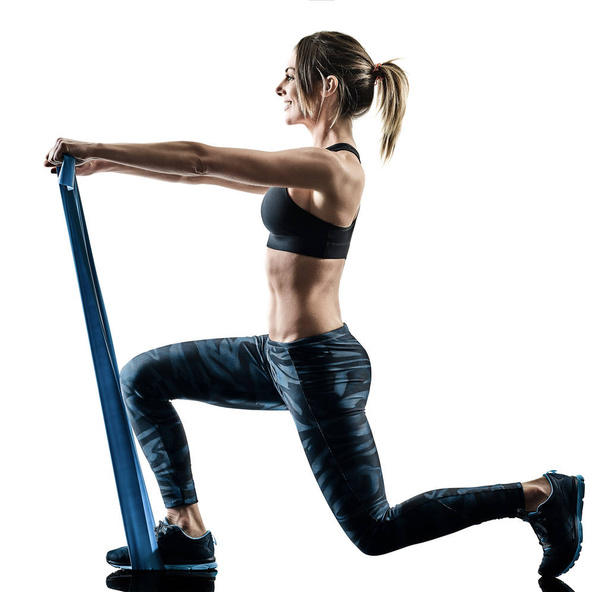 woman pilates fitness elastic resistant band exercises silhouett - Фото, изображение