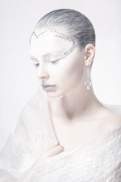 Muse. Theatrical Style. Profile of Woman Face - Creative Carnival Makeup - Valokuva, kuva