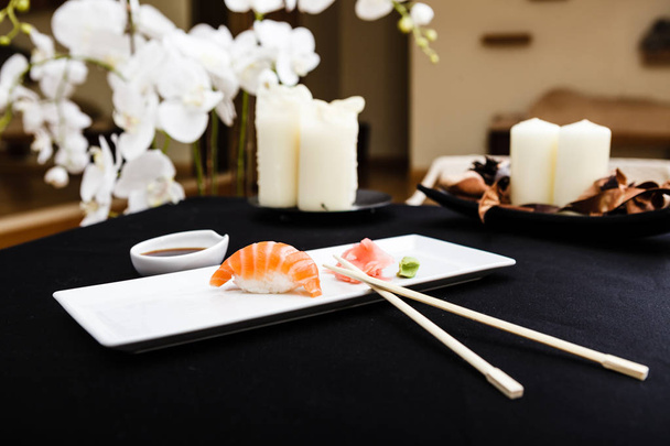 Salmon sushi served on a plate - Photo, Image