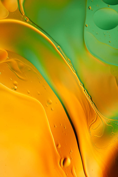 oil drops on a water surface abstract background - Φωτογραφία, εικόνα