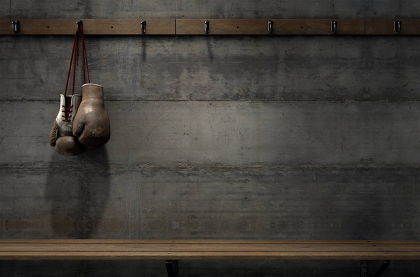 Зношені вінтажні боксерські рукавички висять у кімнаті
 - Фото, зображення