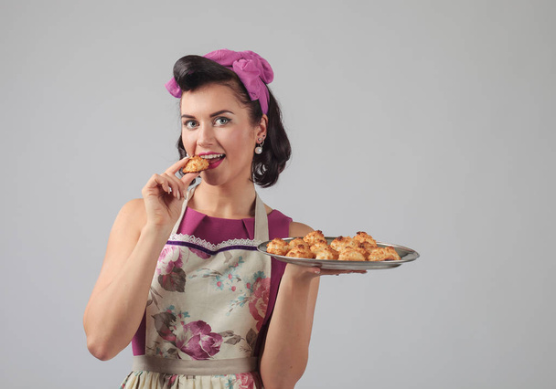 Young beautiful woman with  homemade cookies. - Photo, Image