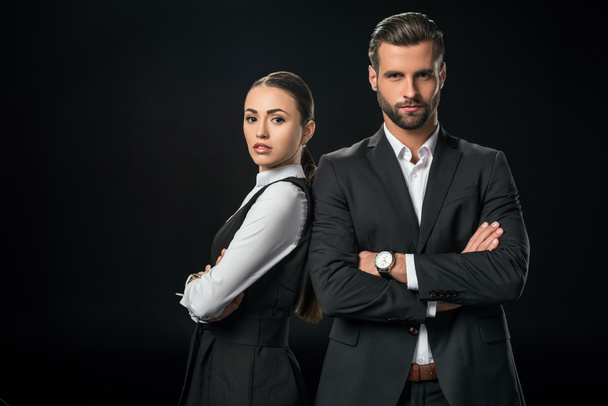 confident businesspeople with crossed arms, isolated on black - Fotografie, Obrázek