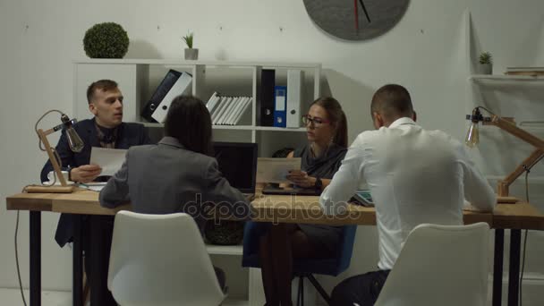 Business colleagues working at open space office - Materiaali, video