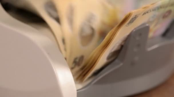 Close up of counting romanian leis bills on counter machine    - Footage, Video