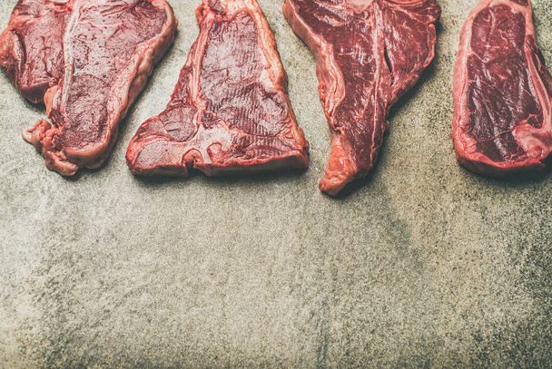  fresh raw beef meat steaks - Фото, изображение