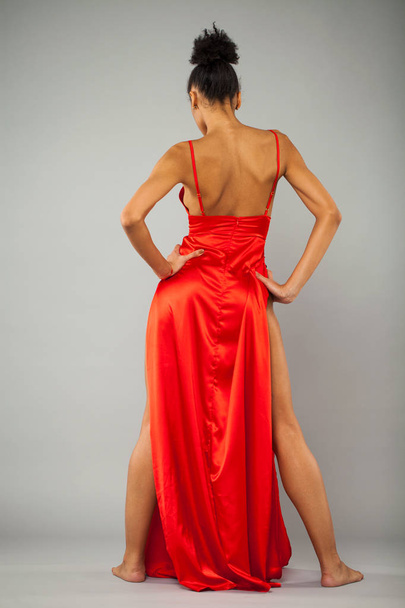 African fashion model. Beautiful young woman in red dress - Zdjęcie, obraz