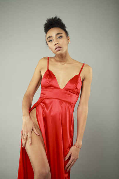 Portrait of sensual young african woman in red dress - Φωτογραφία, εικόνα