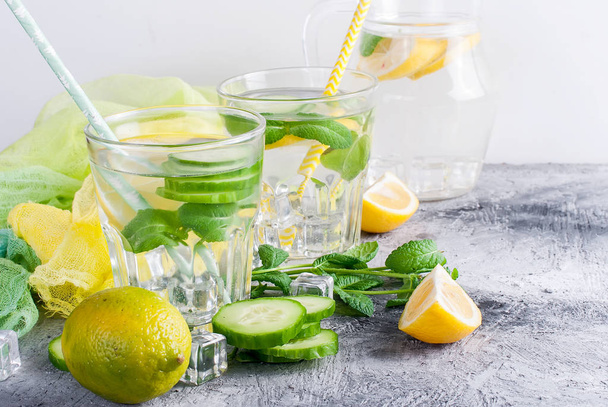 Healthy infused citrus sassi water with Lemon and cucumber  - Fotoğraf, Görsel